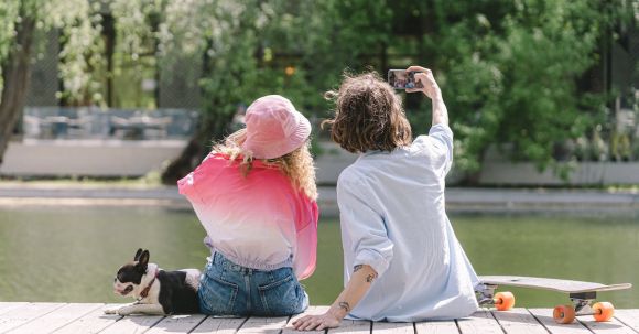 Bulldog - A Couple Taking Their Own Photo with a Smartphone